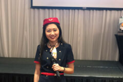 D&D dressing up as Stewardess bilingual singapore female emcee host D&D Theme all over the world